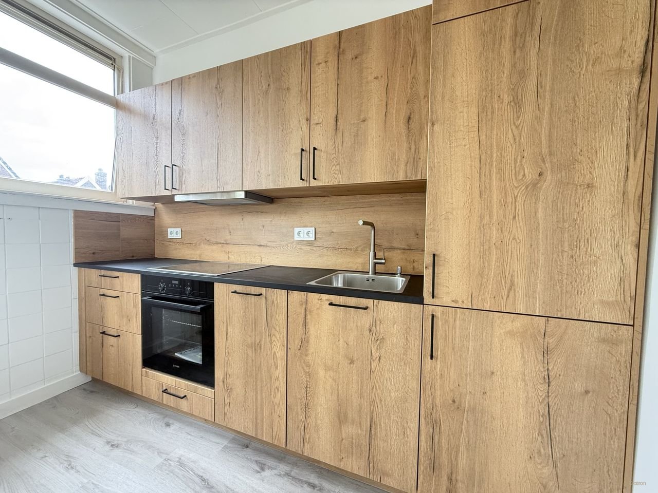 Lichte dubbele bovenwoning met balkon - Afbeelding 3