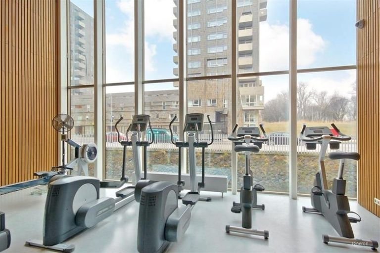 Licht appartement met gym en balkon - Afbeelding 4