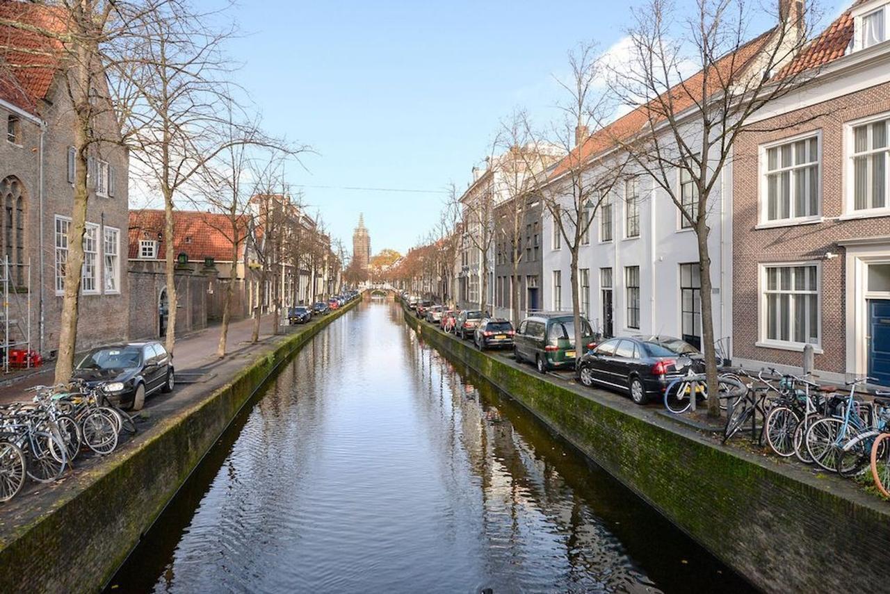 Canal-side living with city garden in Delft - Image 1
