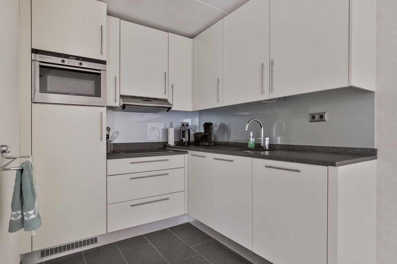 Semi-bungalow met tuin en carport in Tilburg - Afbeelding 10