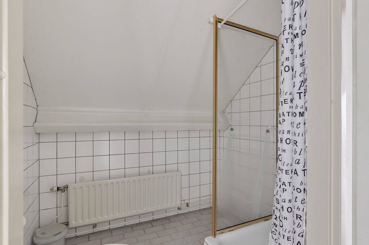 Semi-bungalow met tuin en carport in Tilburg - Afbeelding 24