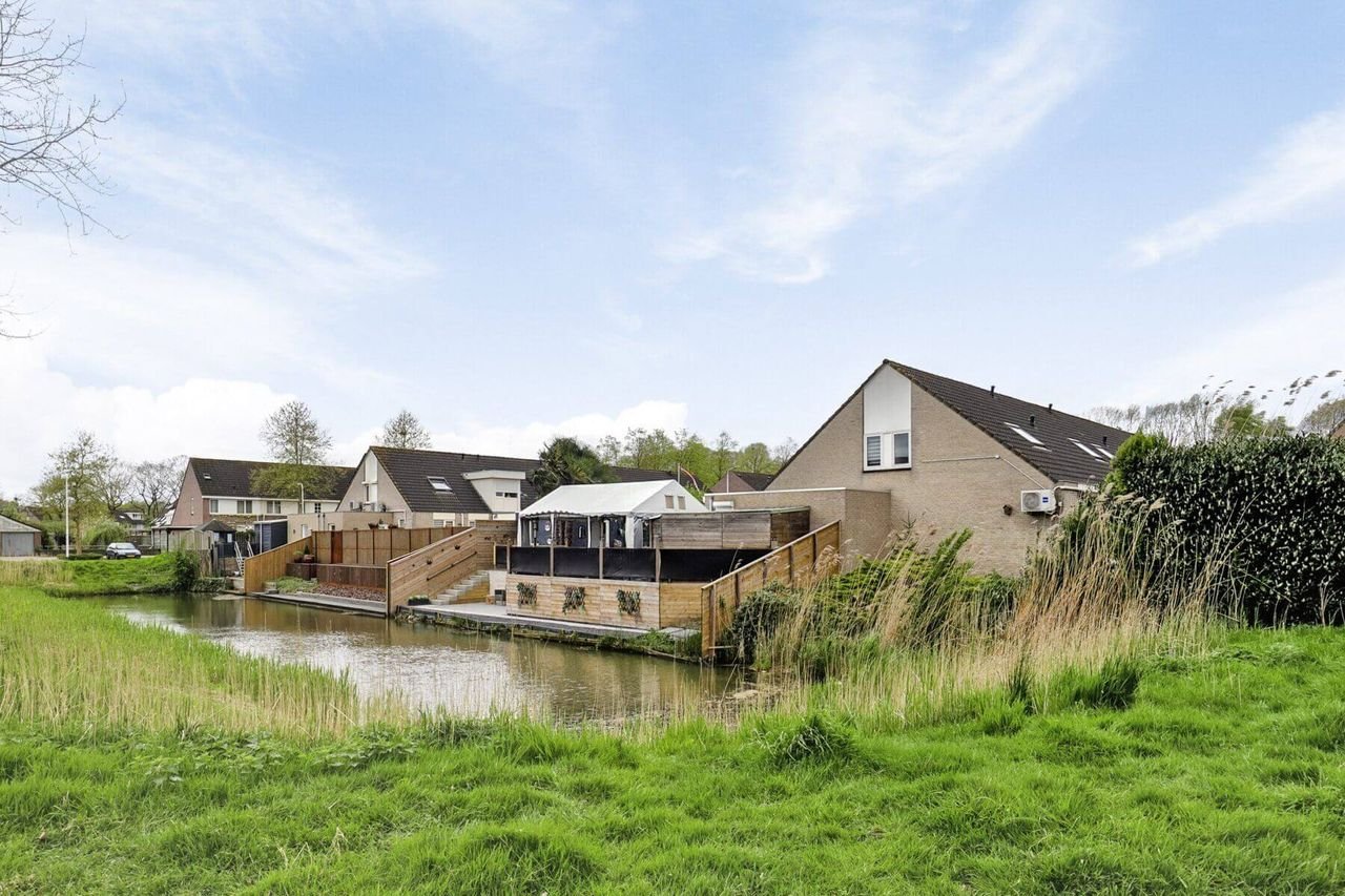 Semi-bungalow met tuin en carport in Tilburg - Afbeelding 30