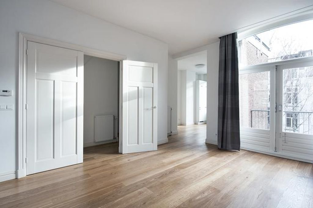 Riant bovenhuis in de P.C. Hooftstraat - Afbeelding 2