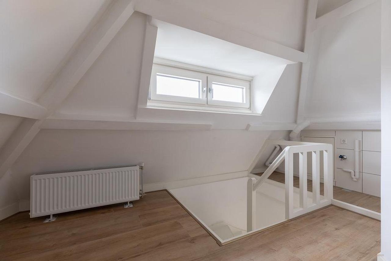 Hoekwoning met 20 meter diepe tuin - Afbeelding 20