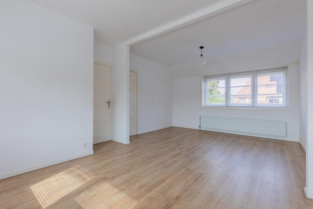 Hoekwoning met 20 meter diepe tuin - Afbeelding 18