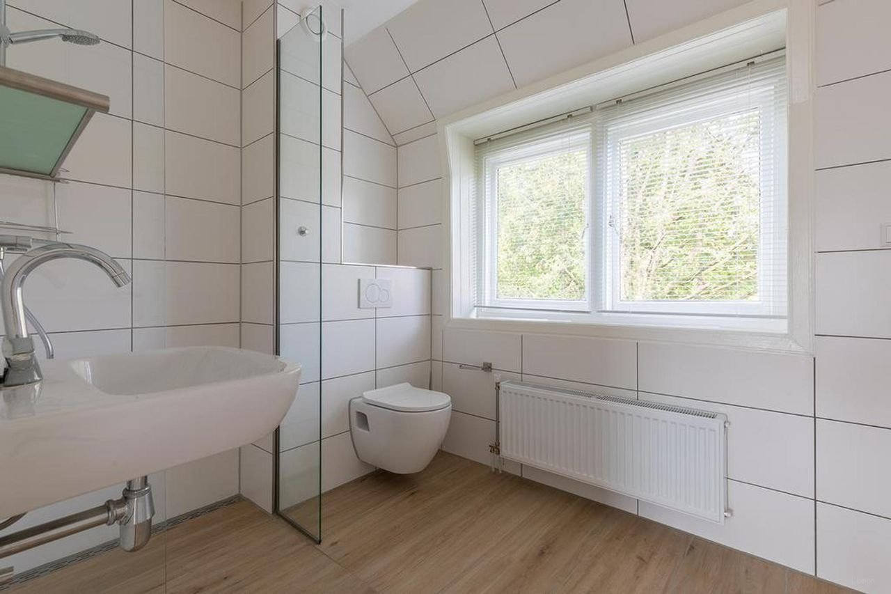 Hoekwoning met 20 meter diepe tuin - Afbeelding 15