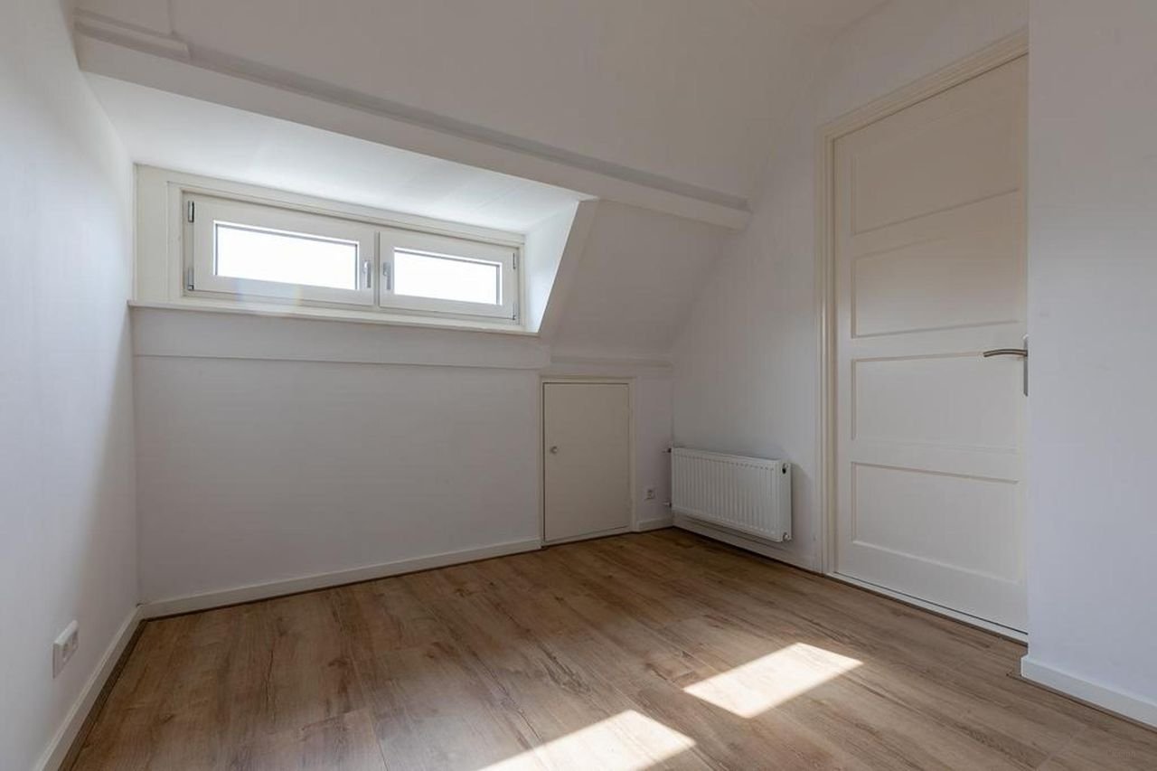 Hoekwoning met 20 meter diepe tuin - Afbeelding 22