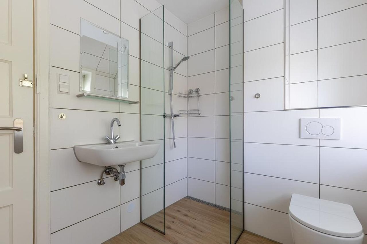 Hoekwoning met 20 meter diepe tuin - Afbeelding 14