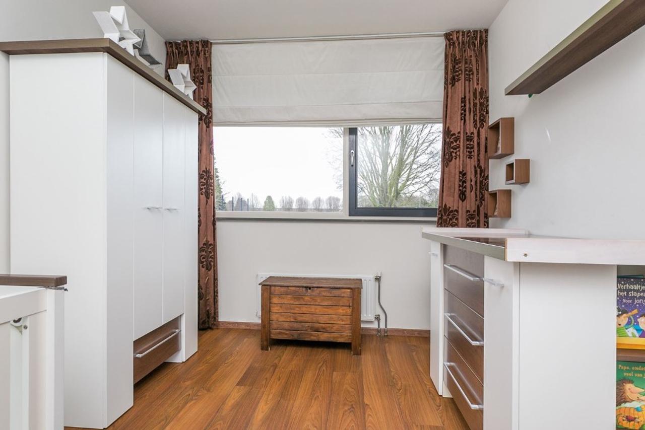 Lichte tussenwoning met 4 slaapkamers in Helmond - Afbeelding 13