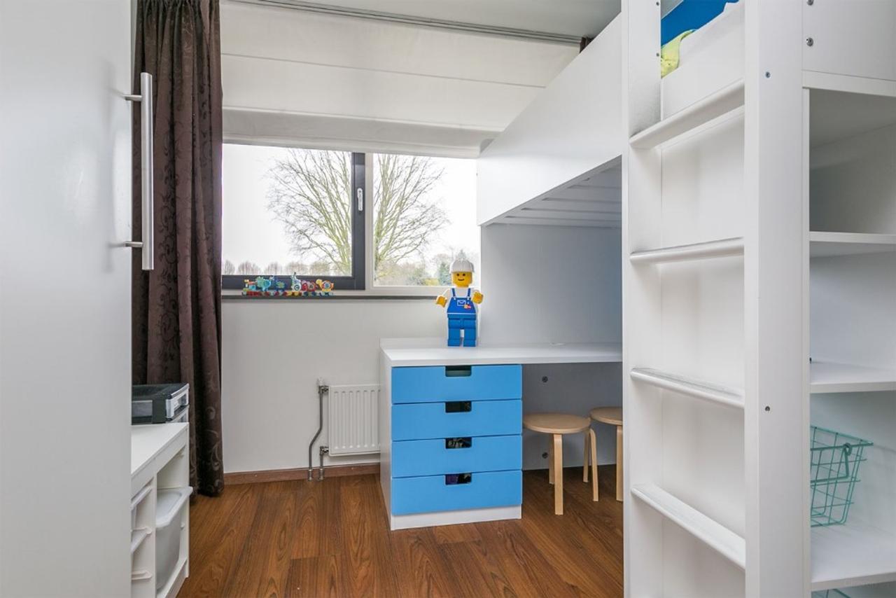 Lichte tussenwoning met 4 slaapkamers in Helmond - Afbeelding 11