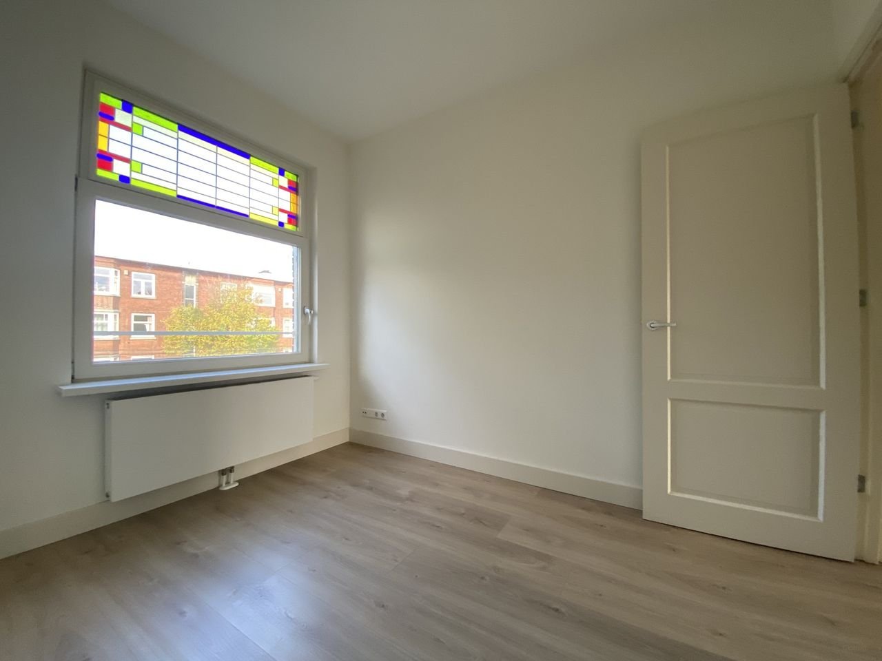 Gerenoveerd 5-kamer appartement met breed balkon - Afbeelding 12