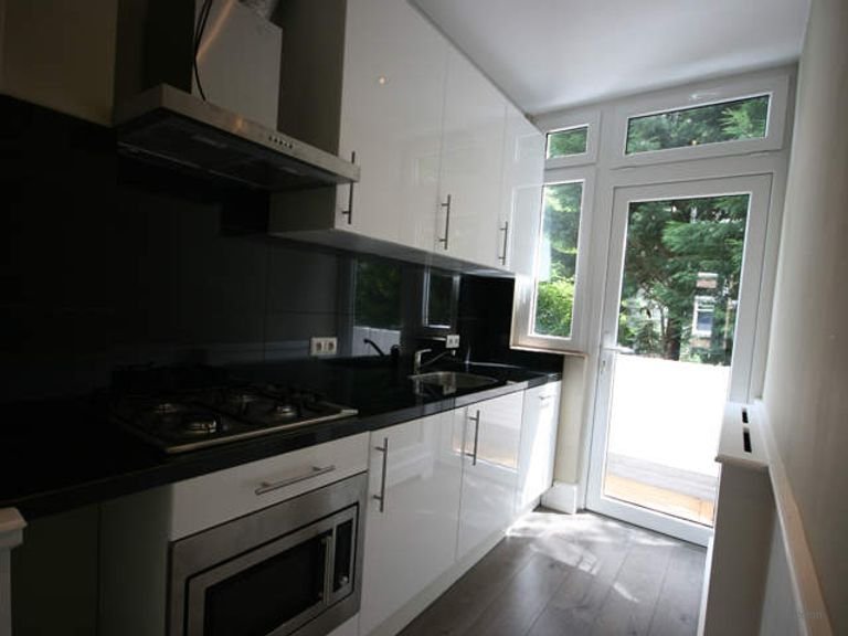 Licht 3-kamer appartement bij Zuiderpark - Afbeelding 4