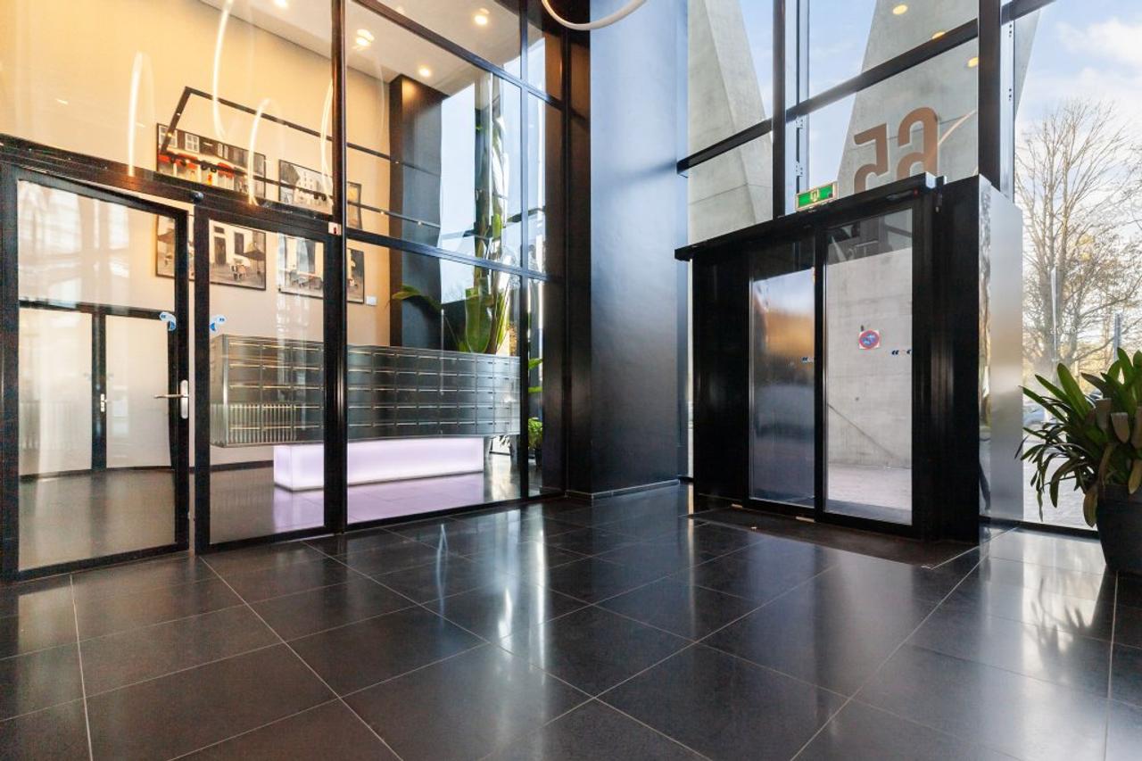 Licht 101m² appartement met weids uitzicht - Afbeelding 28