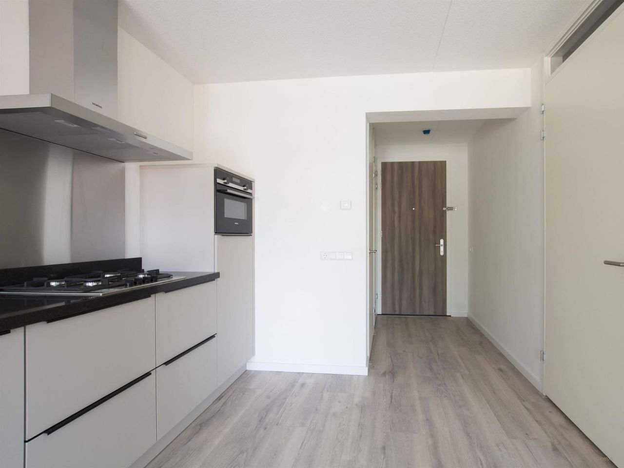 Modern appartement met groene binnentuin - Afbeelding 2