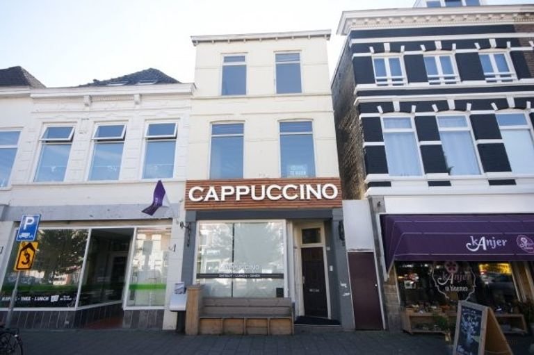 Bovenwoning met houtkachel en terras - Afbeelding 1