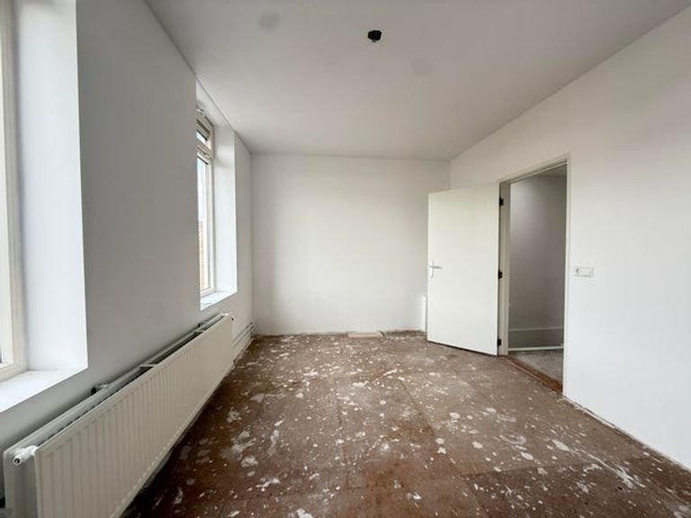 Bovenwoning met houtkachel en terras - Afbeelding 9