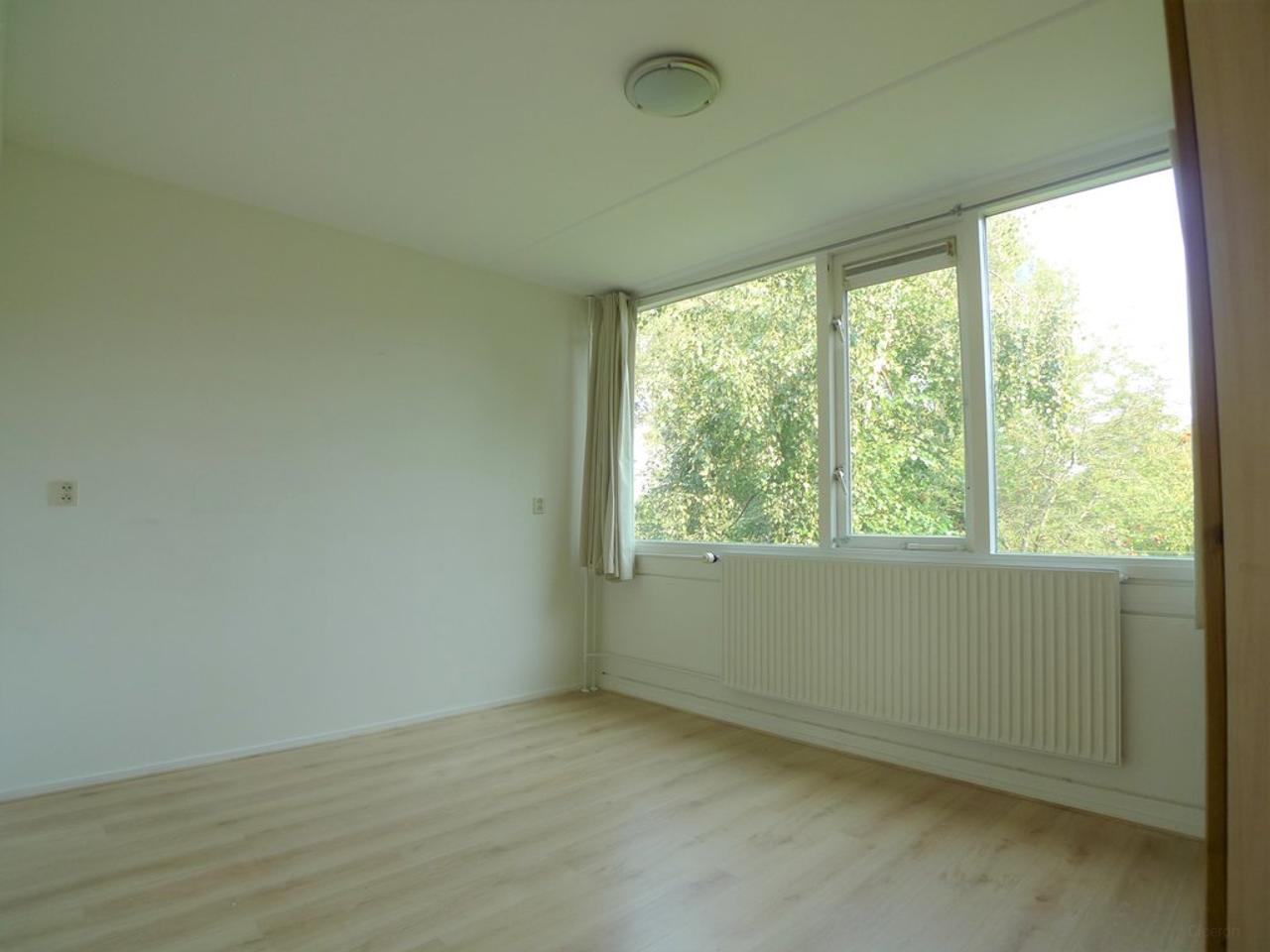 Eengezinswoning met 4 slaapkamers en tuin - Afbeelding 13
