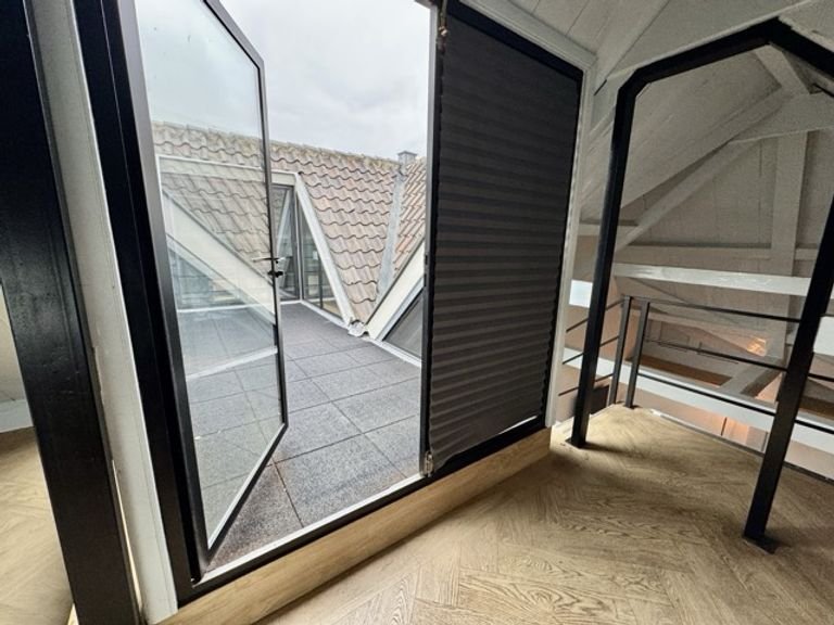 Gemeubileerde loft met terras in centrum Dordt - Afbeelding 16