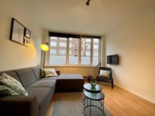 Furnished 2-bedroom apartment with garden - Image 2