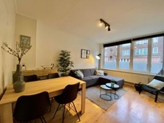 Furnished 2-bedroom apartment with garden - Image 1