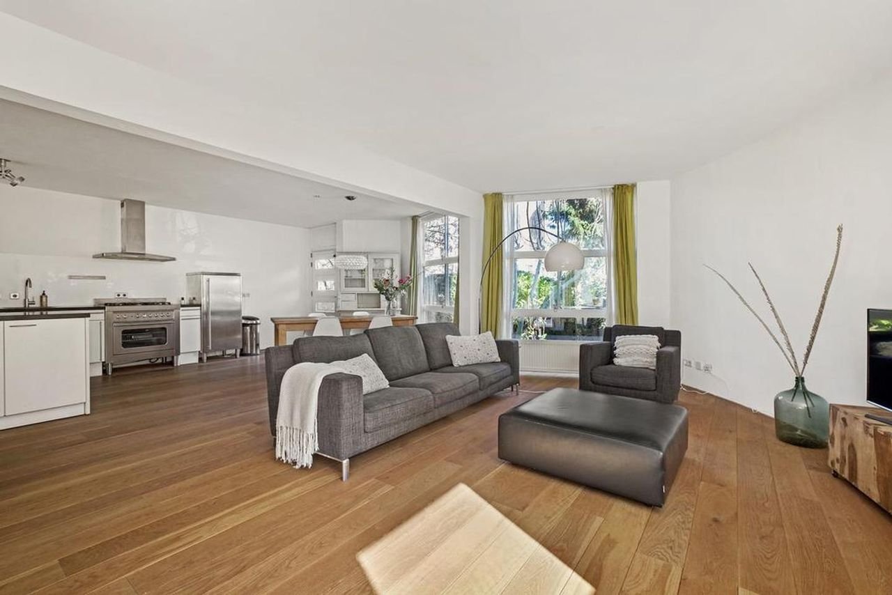 Modern wonen met tuin in de Rivierenbuurt - Afbeelding 1