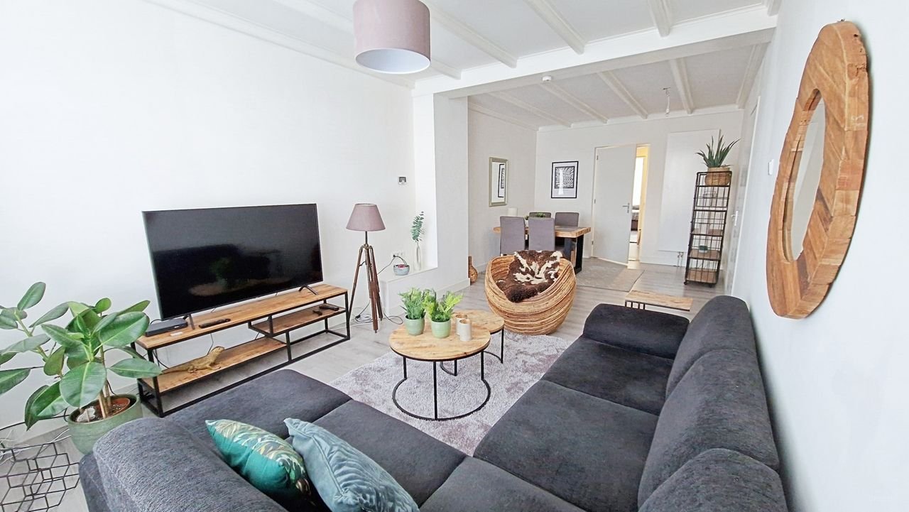 Gemeubileerd 2-kamerappartement met tuin - Afbeelding 1