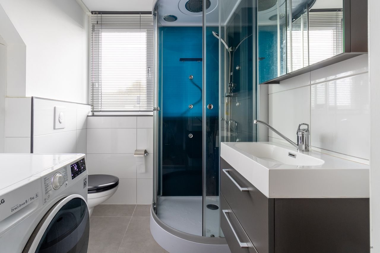 Ruime gezinswoning met tuin in Schiebroek - Afbeelding 12