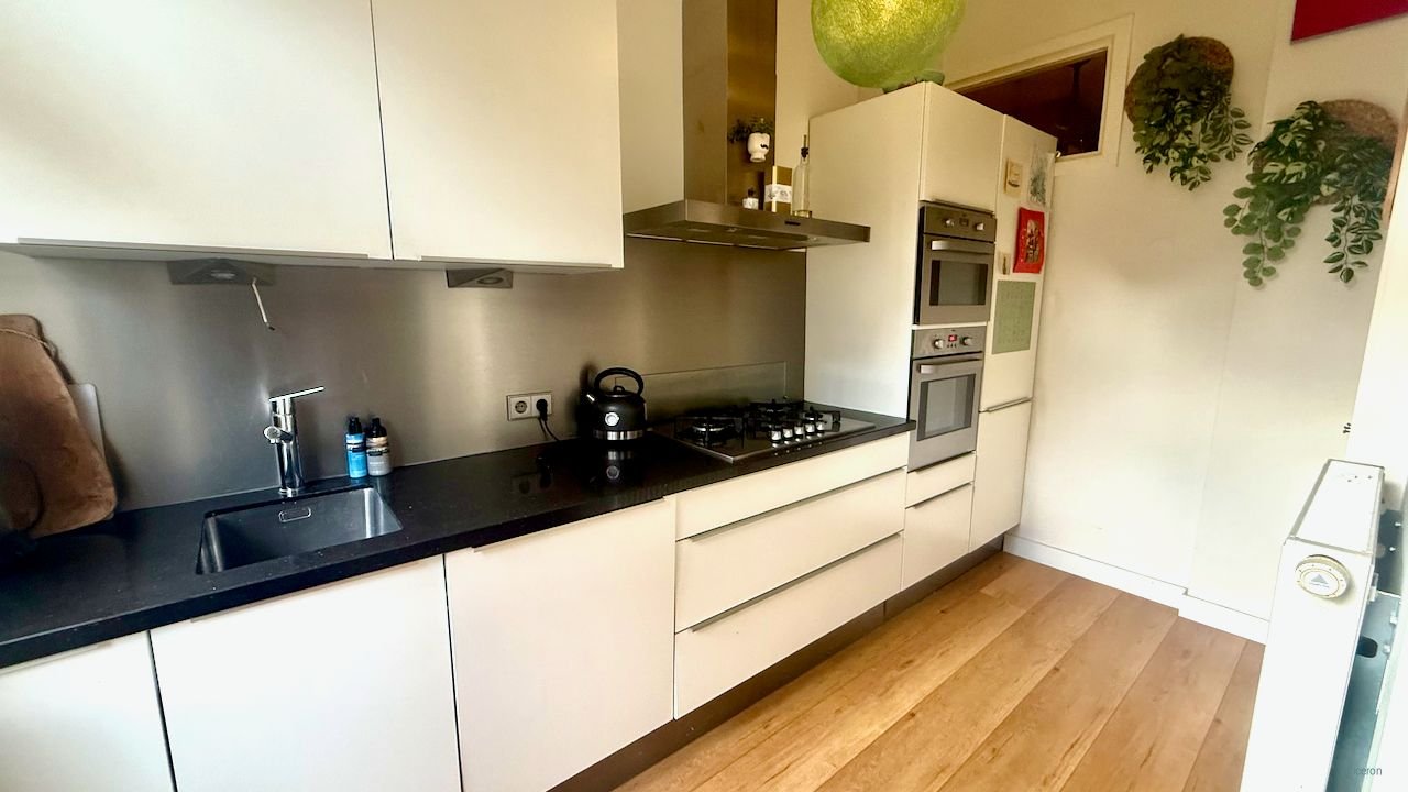 Benedenhuis met tuin aan de Vondelstraat - Afbeelding 11