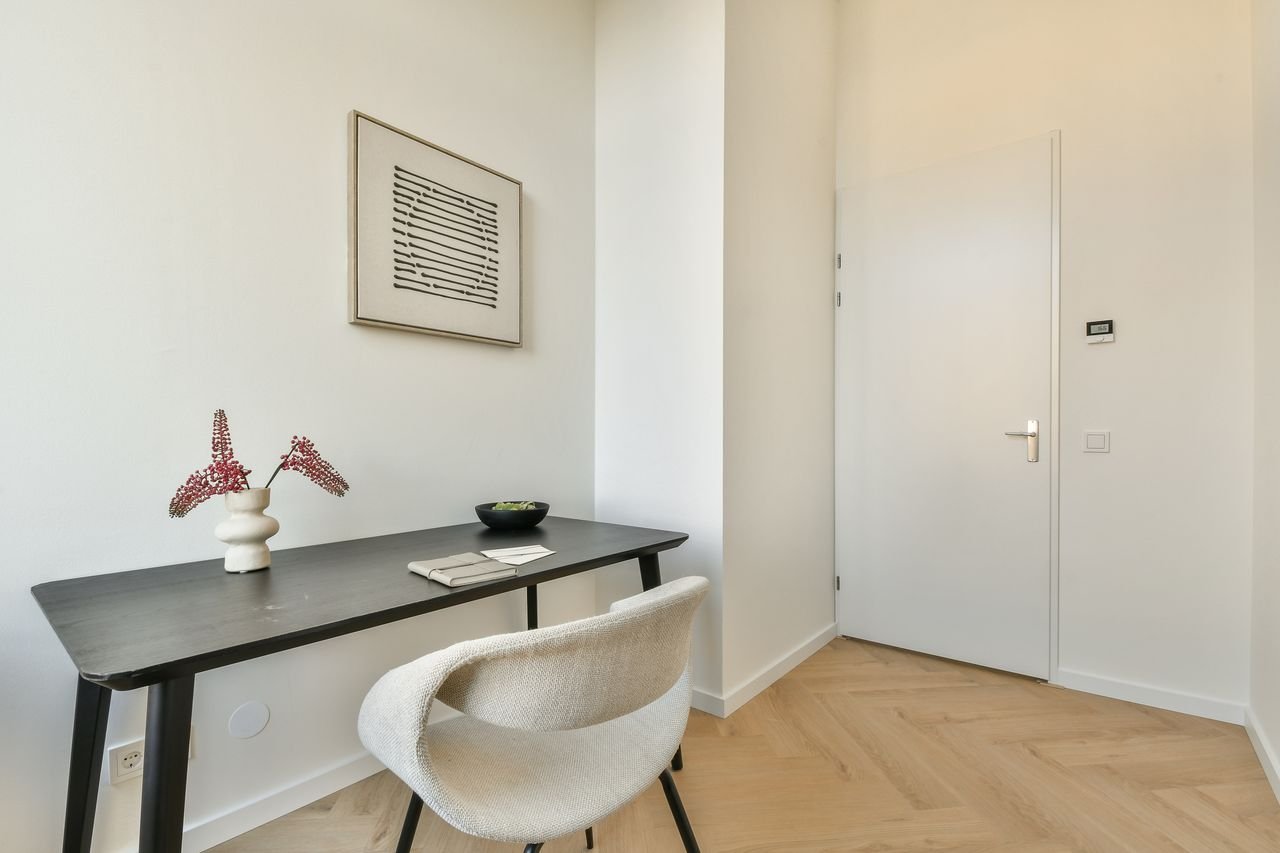 Licht penthouse met uitzicht in Westerpark - Afbeelding 12