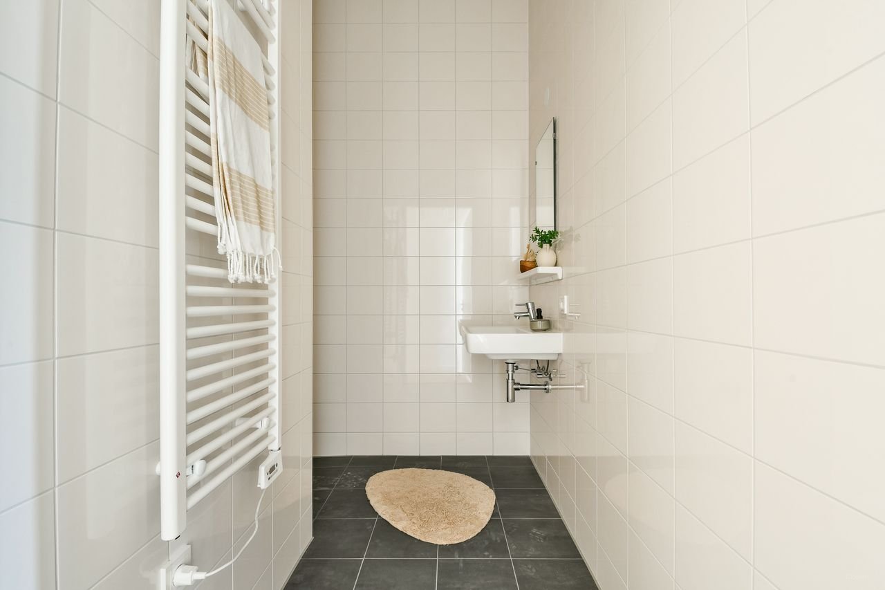 Licht penthouse met uitzicht in Westerpark - Afbeelding 15
