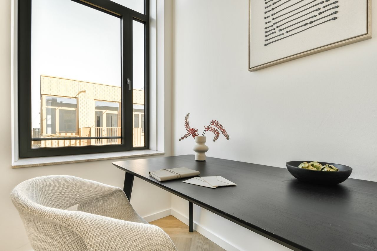 Licht penthouse met uitzicht in Westerpark - Afbeelding 13