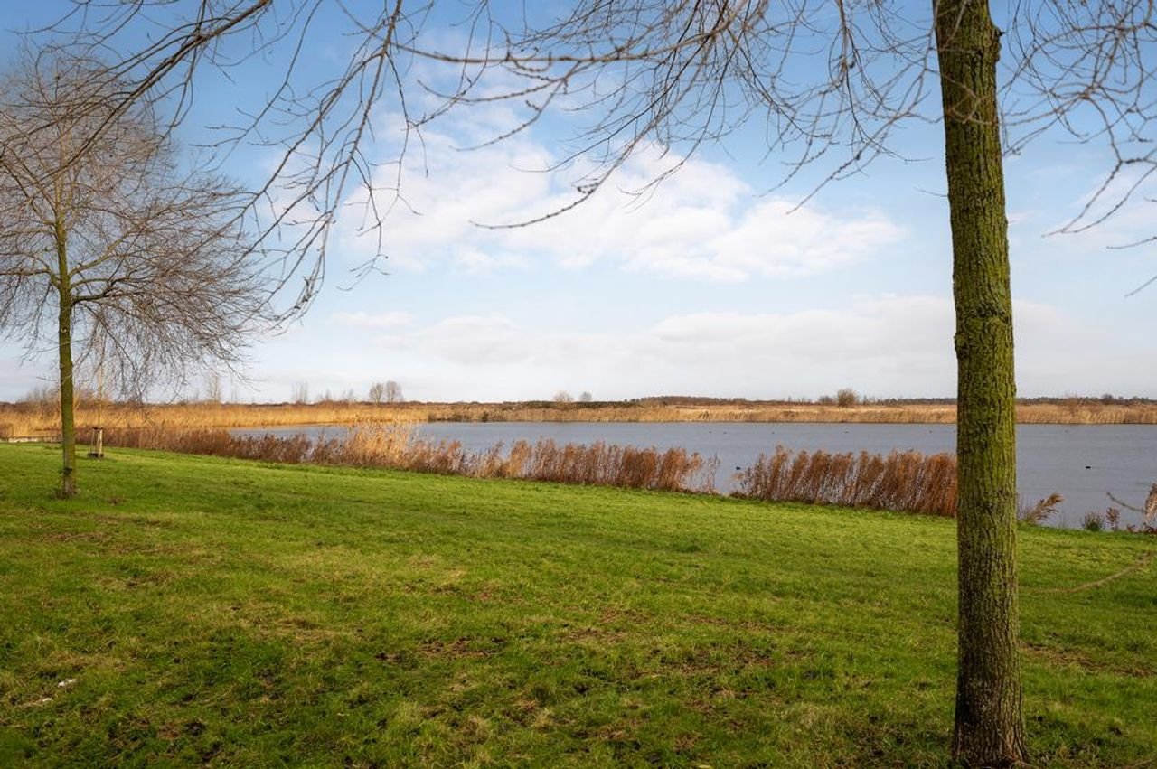 Herenhuis met garage en uitzicht op water - Afbeelding 39