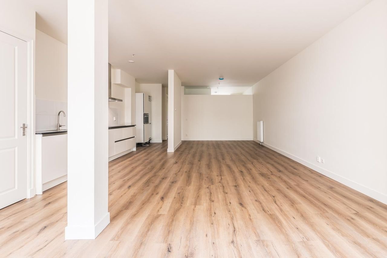 Benedenhuis met zonnige tuin aan de Nassaukade - Afbeelding 9