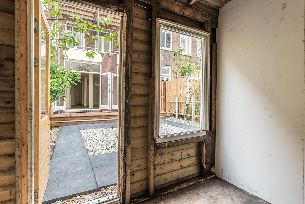 Benedenhuis met zonnige tuin aan de Nassaukade - Afbeelding 22