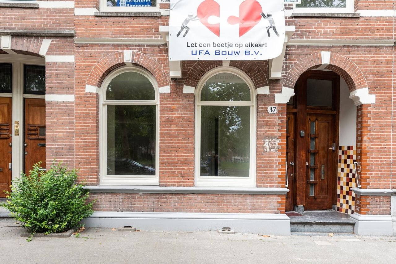Benedenhuis met zonnige tuin aan de Nassaukade - Afbeelding 21