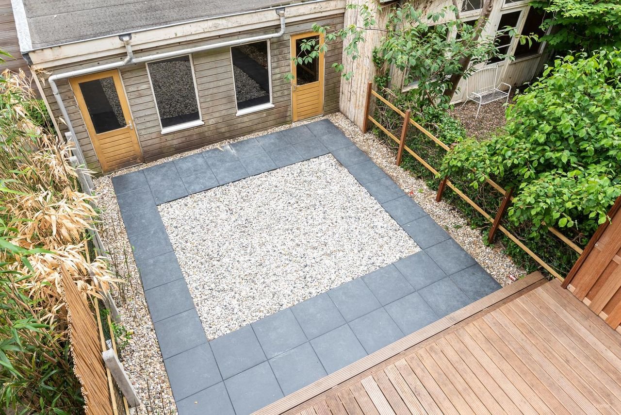 Benedenhuis met zonnige tuin aan de Nassaukade - Afbeelding 18