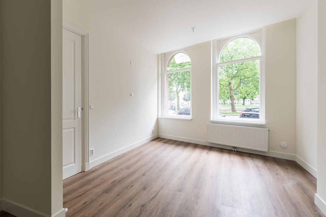 Benedenhuis met zonnige tuin aan de Nassaukade - Afbeelding 16