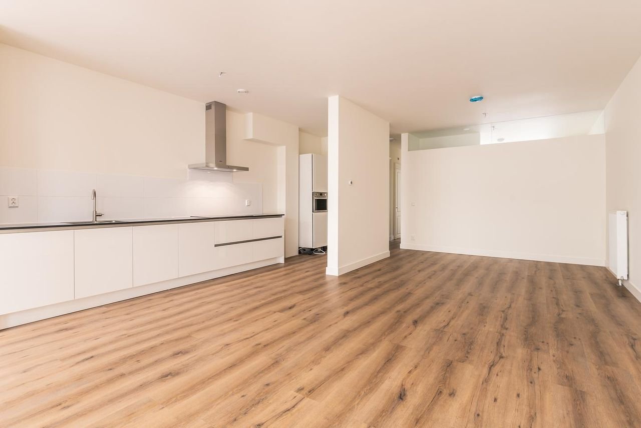 Benedenhuis met zonnige tuin aan de Nassaukade - Afbeelding 5