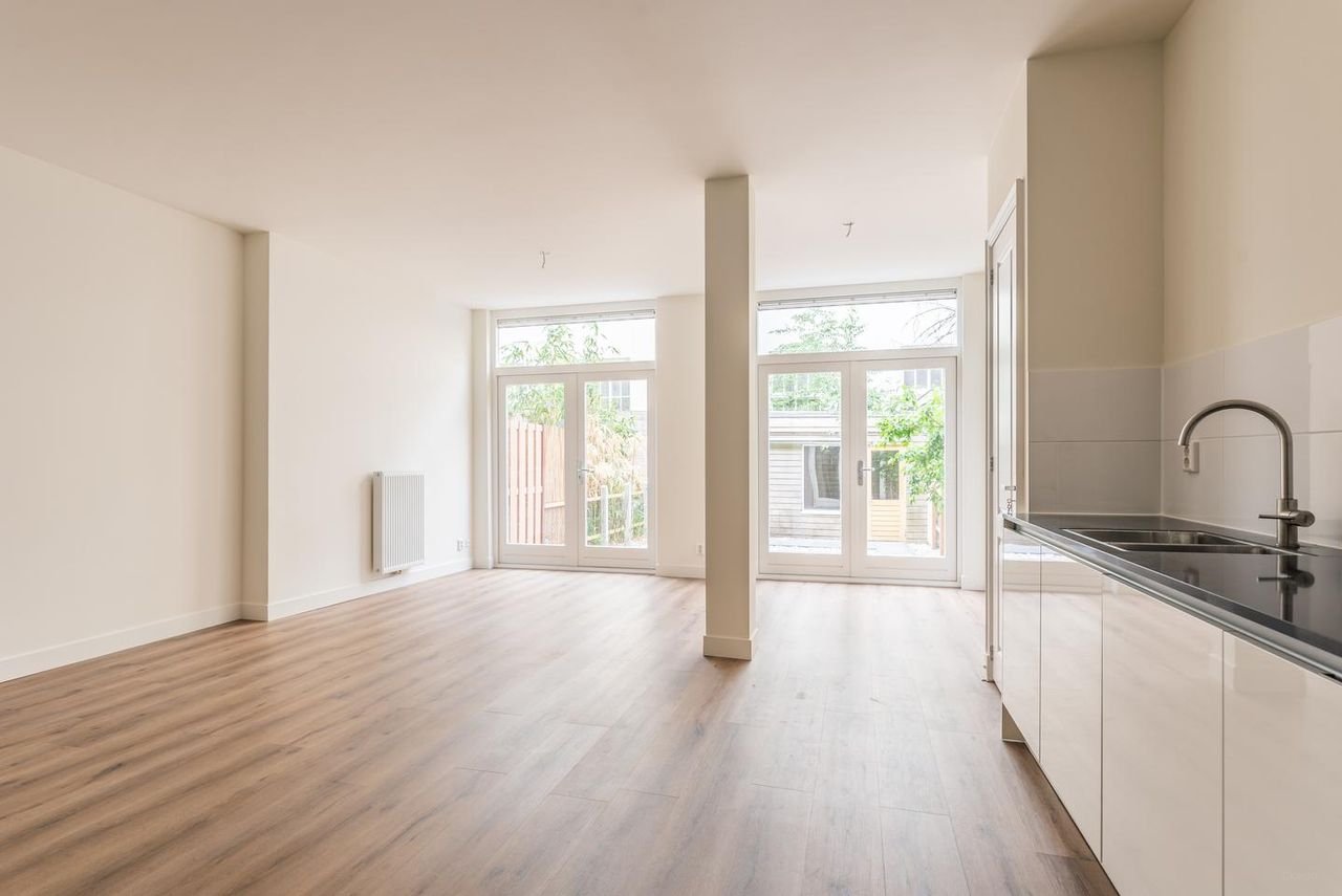 Benedenhuis met zonnige tuin aan de Nassaukade - Afbeelding 10