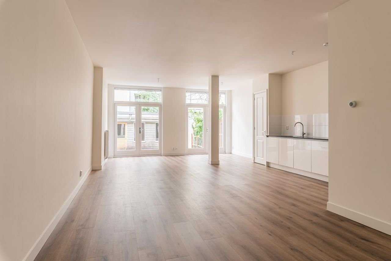 Benedenhuis met zonnige tuin aan de Nassaukade - Afbeelding 4