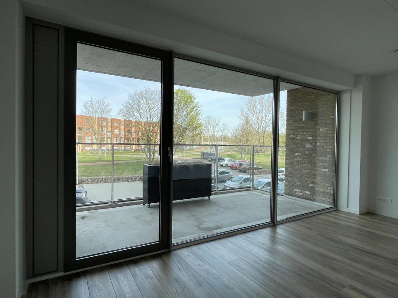 77 m² met balkon en eigen parkeerplek - Afbeelding 3