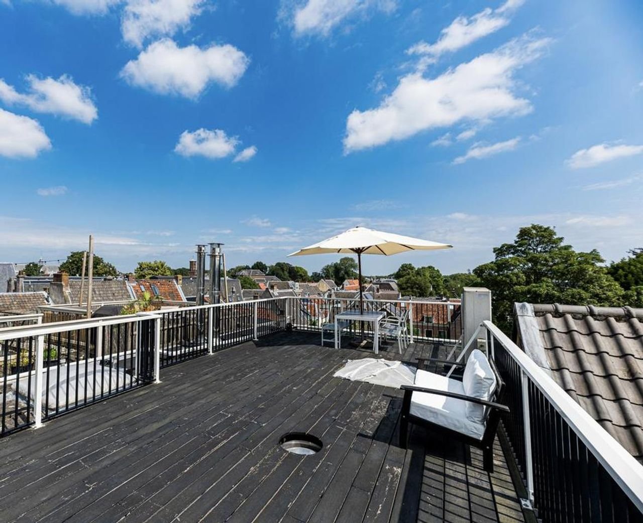 Luxe grachtenpand met terras en parkeren - Afbeelding 5