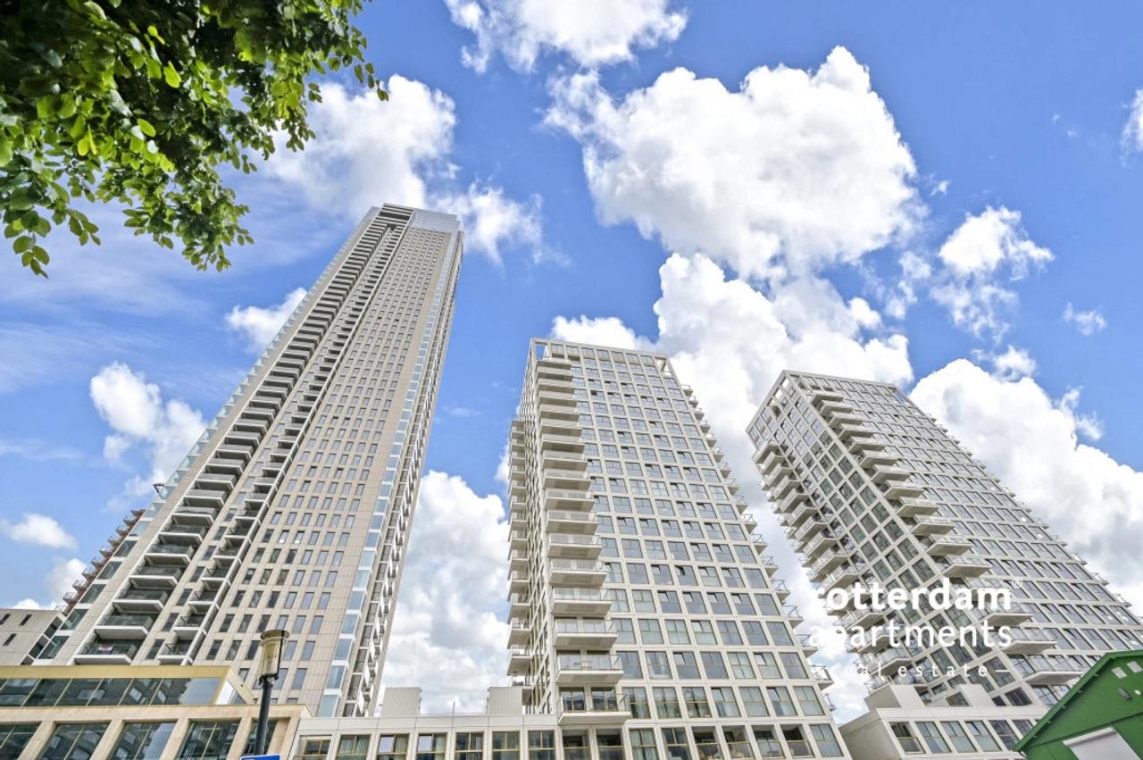 Skylinezicht vanuit je 3-slaapkamerappartement - Afbeelding 1
