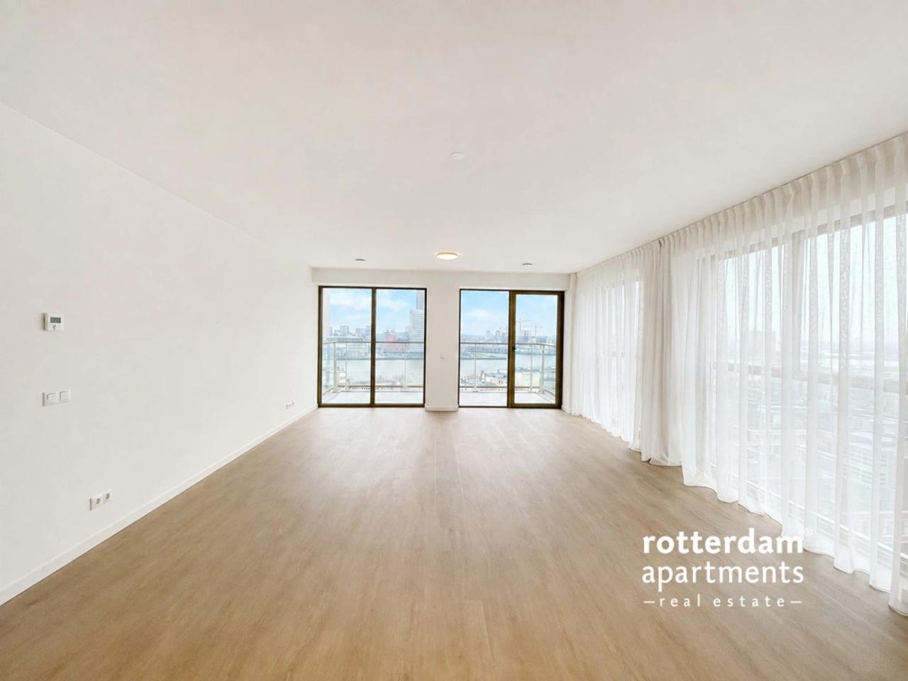 Skylinezicht vanuit je 3-slaapkamerappartement - Afbeelding 5