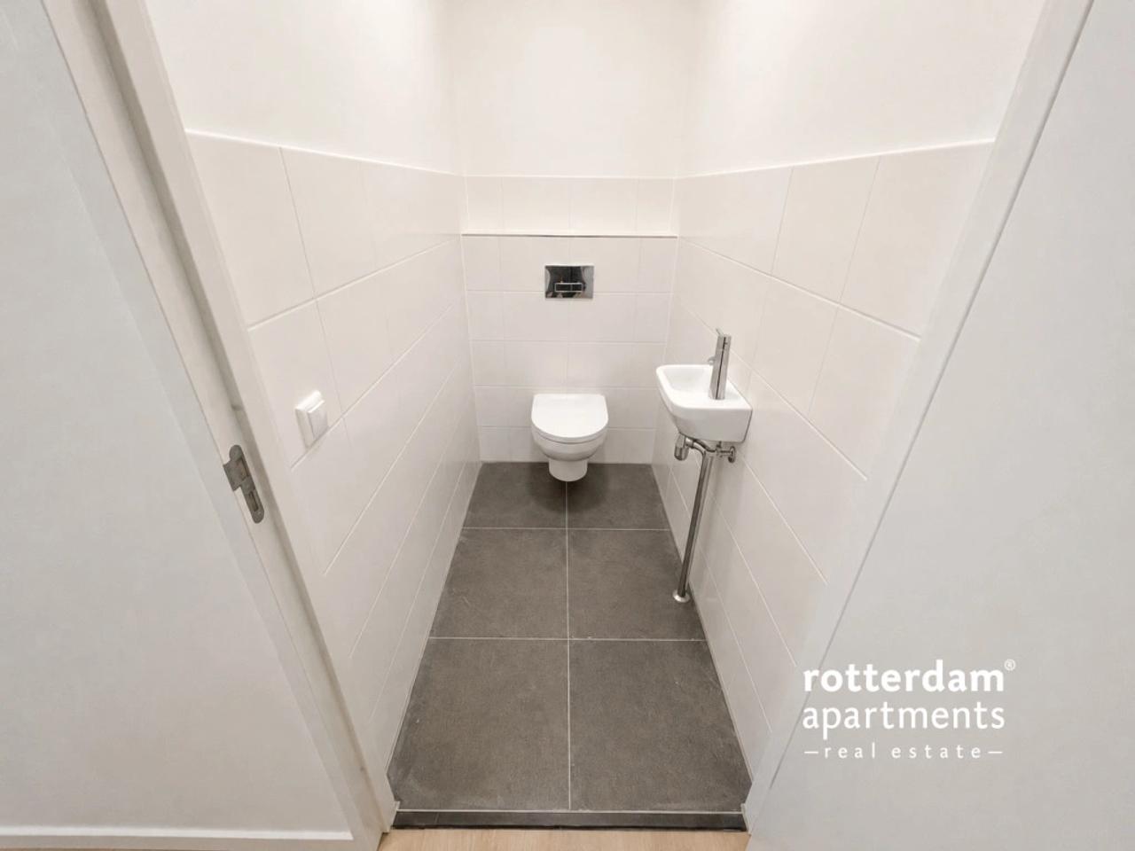 Skylinezicht vanuit je 3-slaapkamerappartement - Afbeelding 10