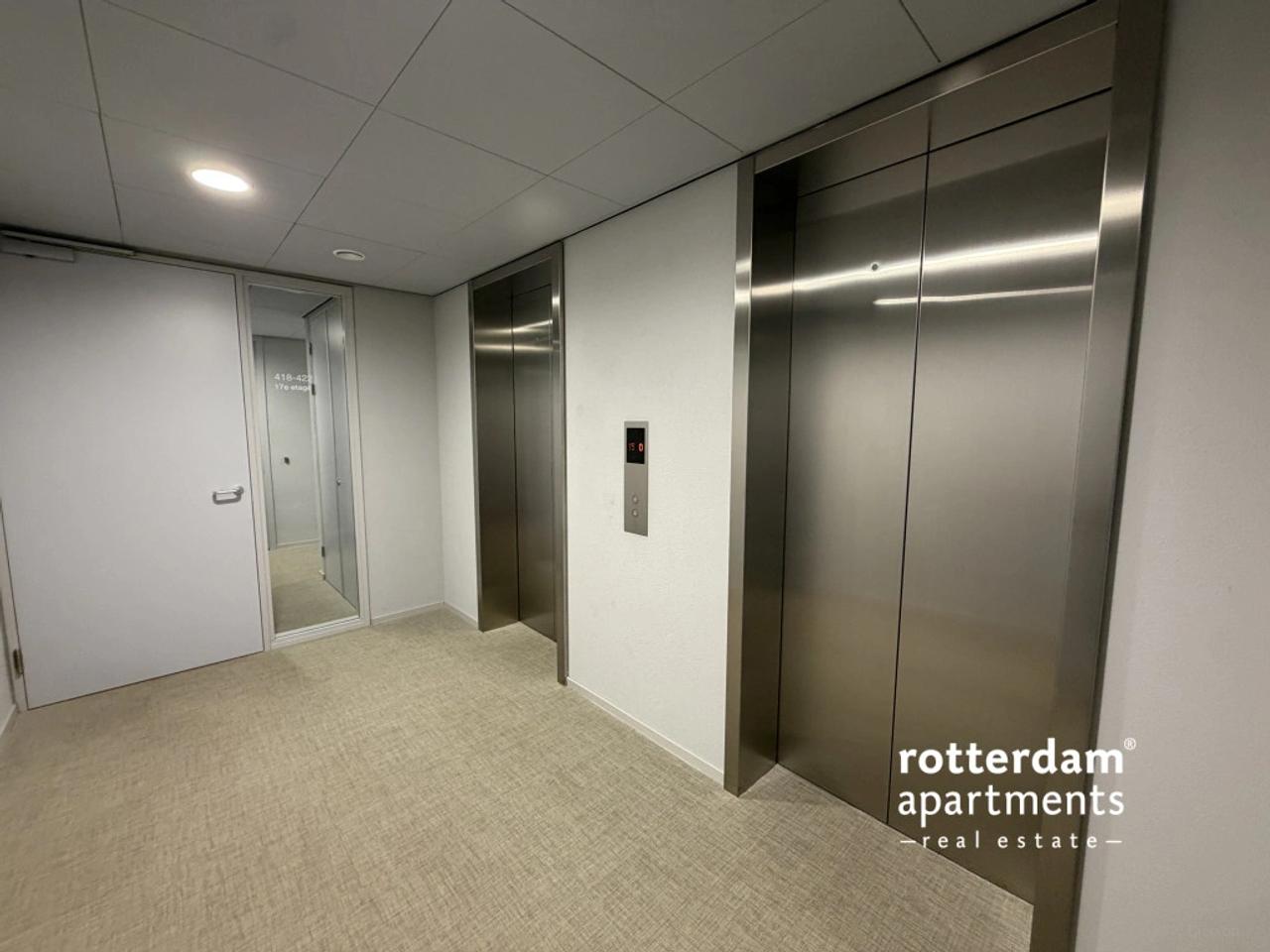 Skylinezicht vanuit je 3-slaapkamerappartement - Afbeelding 20