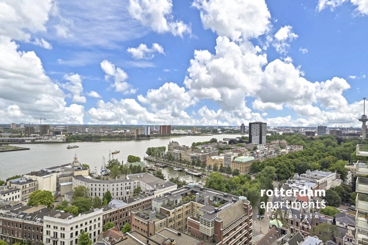 Skylinezicht vanuit je 3-slaapkamerappartement - Afbeelding 24