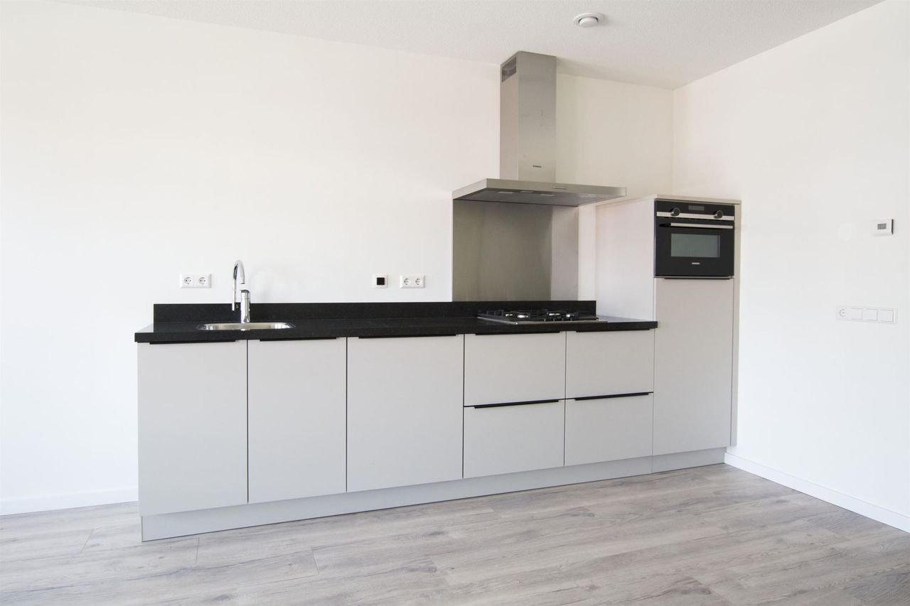 Modern appartement met gezamenlijke tuin - Afbeelding 2