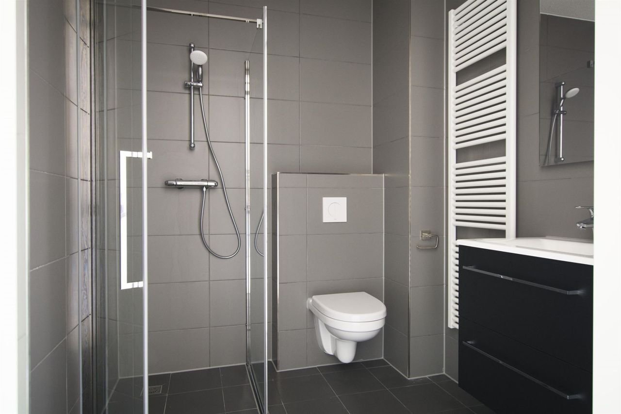 Modern appartement met gezamenlijke tuin - Afbeelding 3