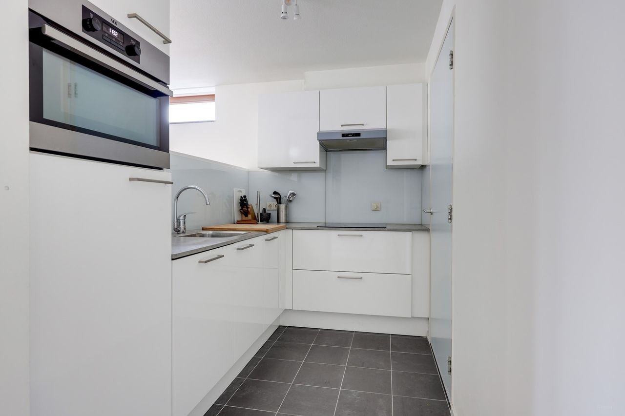 Ruim appartement met dakterras in centrum - Afbeelding 2